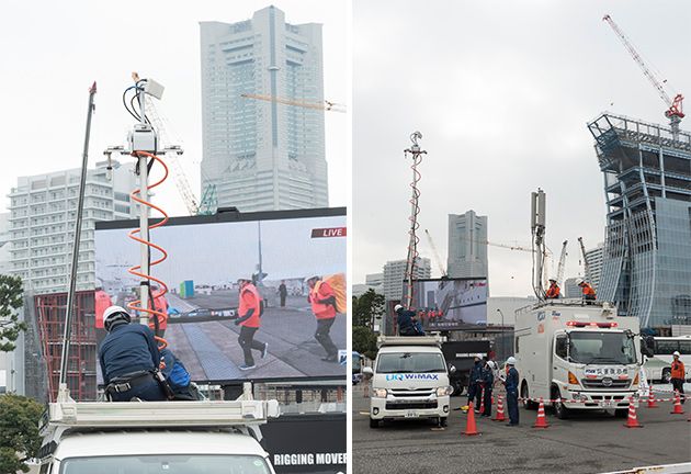KDDIの災害対策公開訓練にて、出動要請を受けてアンテナを設営する車載型基地局